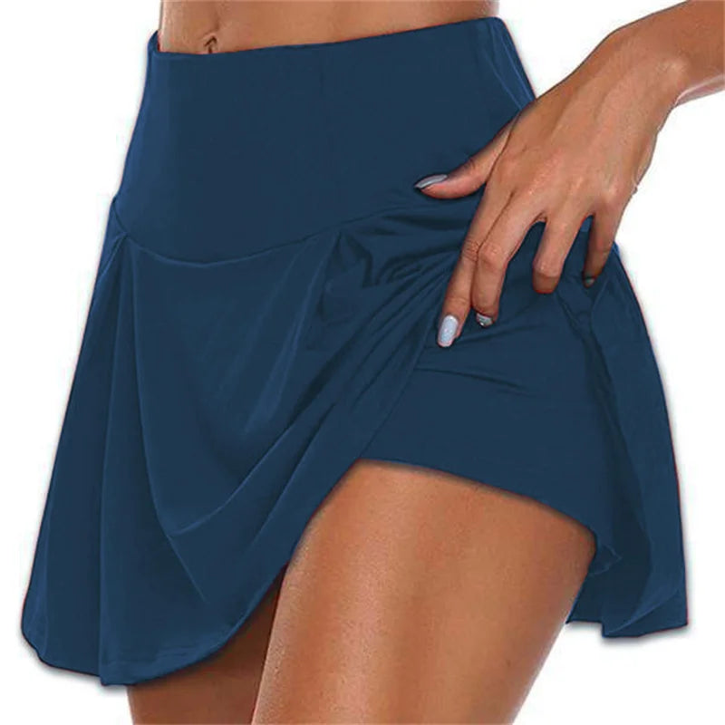 Navy blue skirt worn by a person on a white background