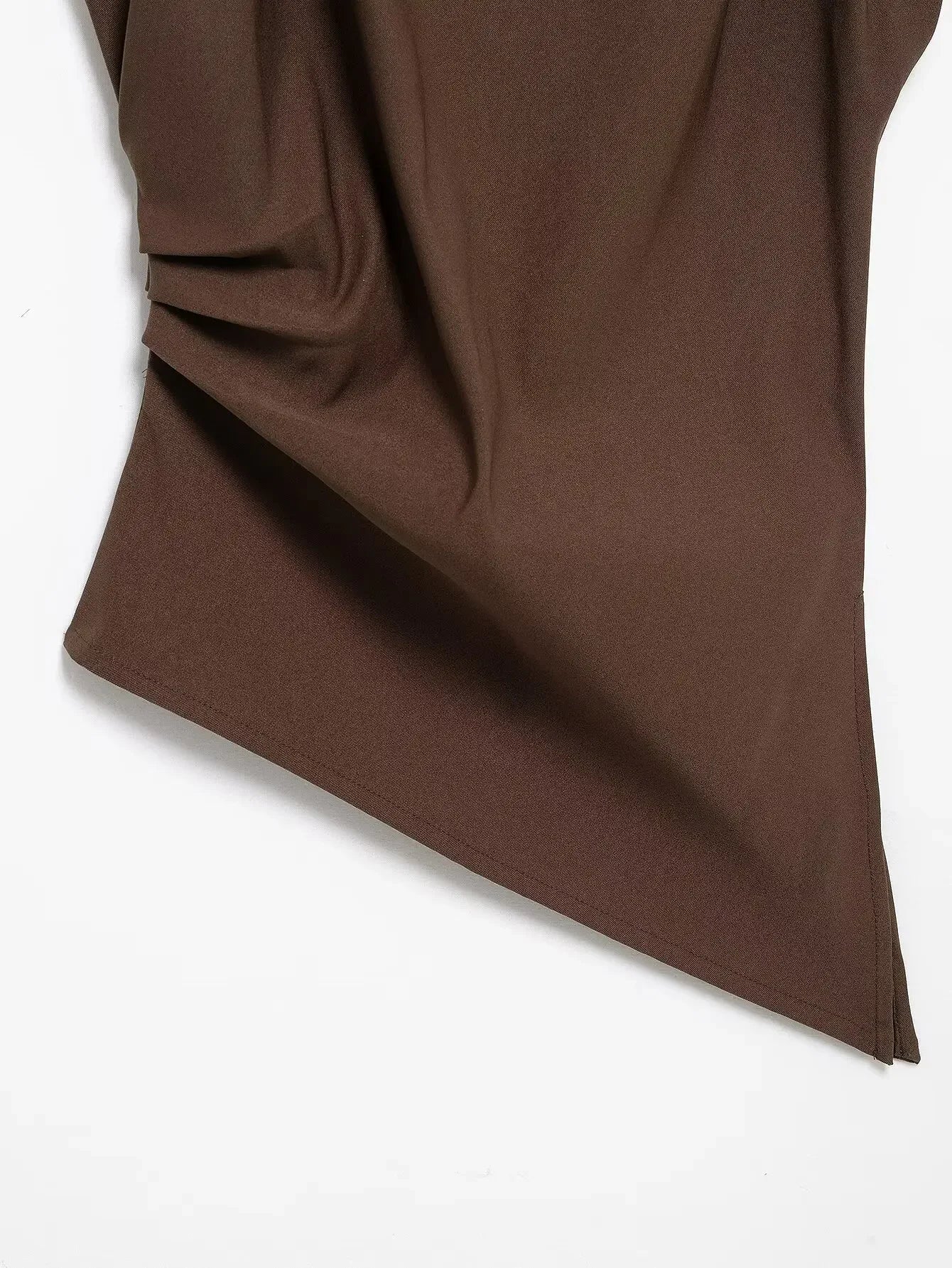Brown fabric with a draped design on a white background