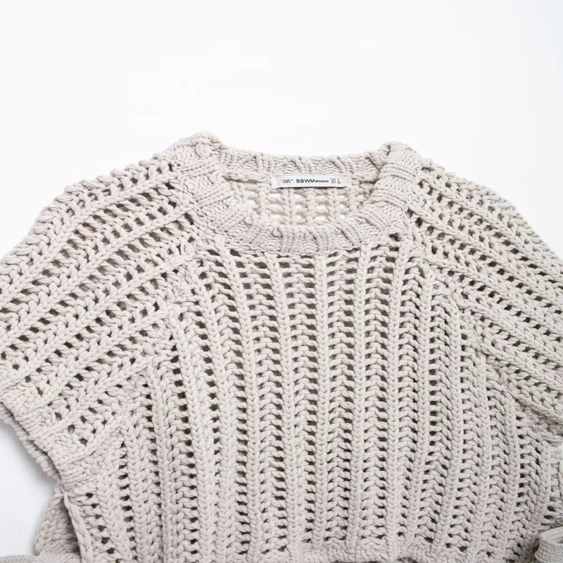 Light gray knit cardigan on a white background