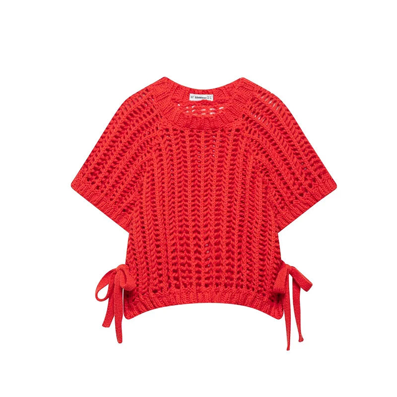 Red knitted sweater with tie sleeves on a white background