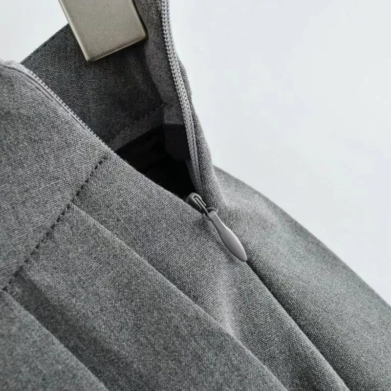 Gray fabric with a zipper on a white background