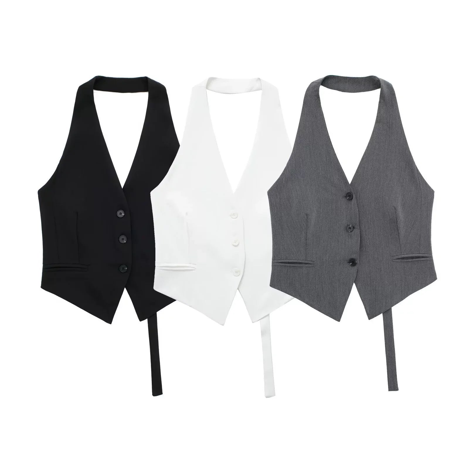 Black, white, and gray vests on a white background