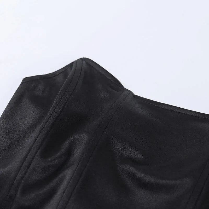 Close-up of black fabric on a light gray background